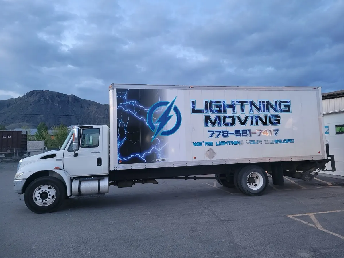 The Lightning Moving box truck parked in Kamloops, lettered with 778-581-7417